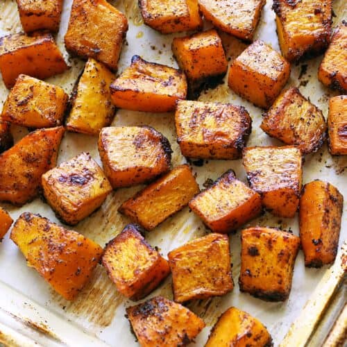 Roasted pumpkin on a baking sheet.