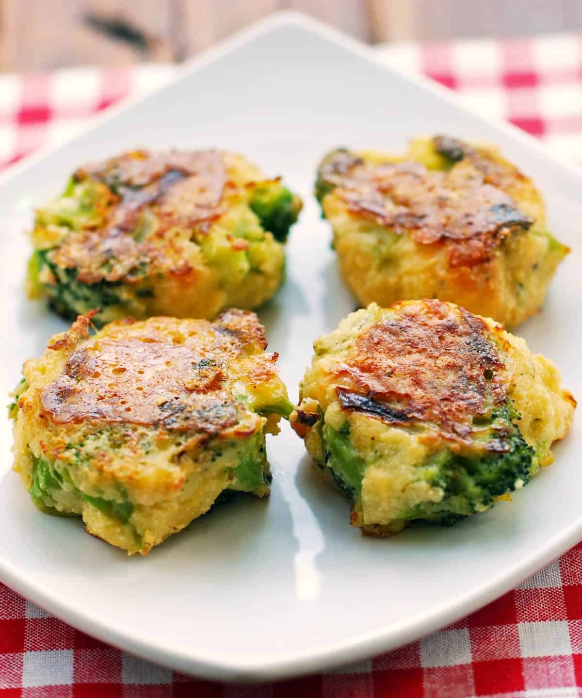 Broccoli tots served on a white plate. 