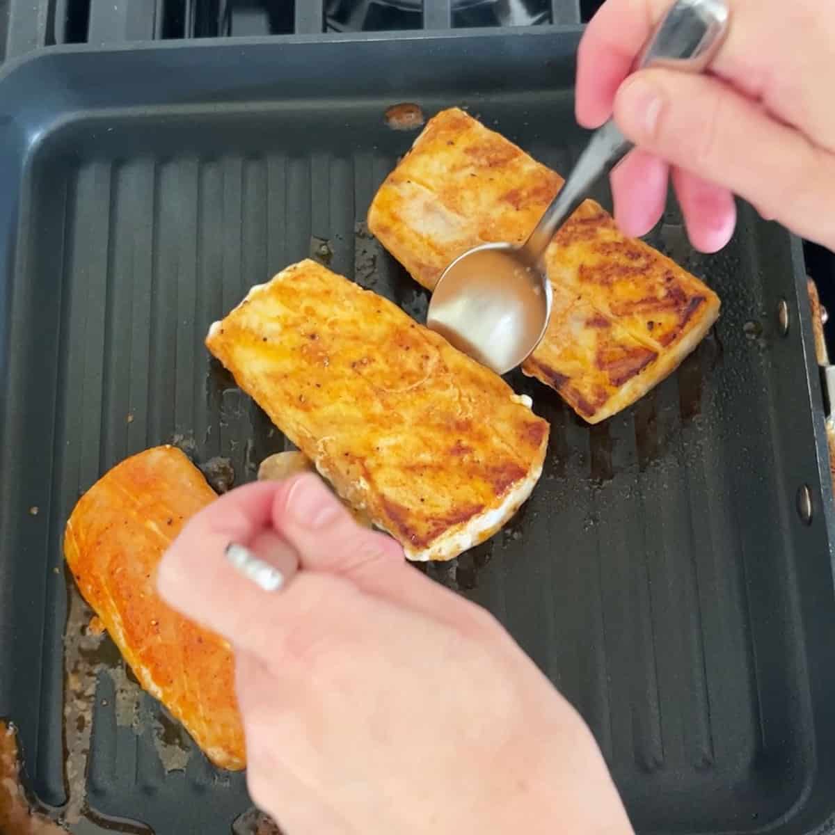 Grilling the fish.