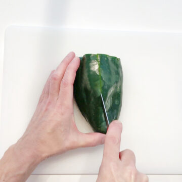 Preparing the poblanos.