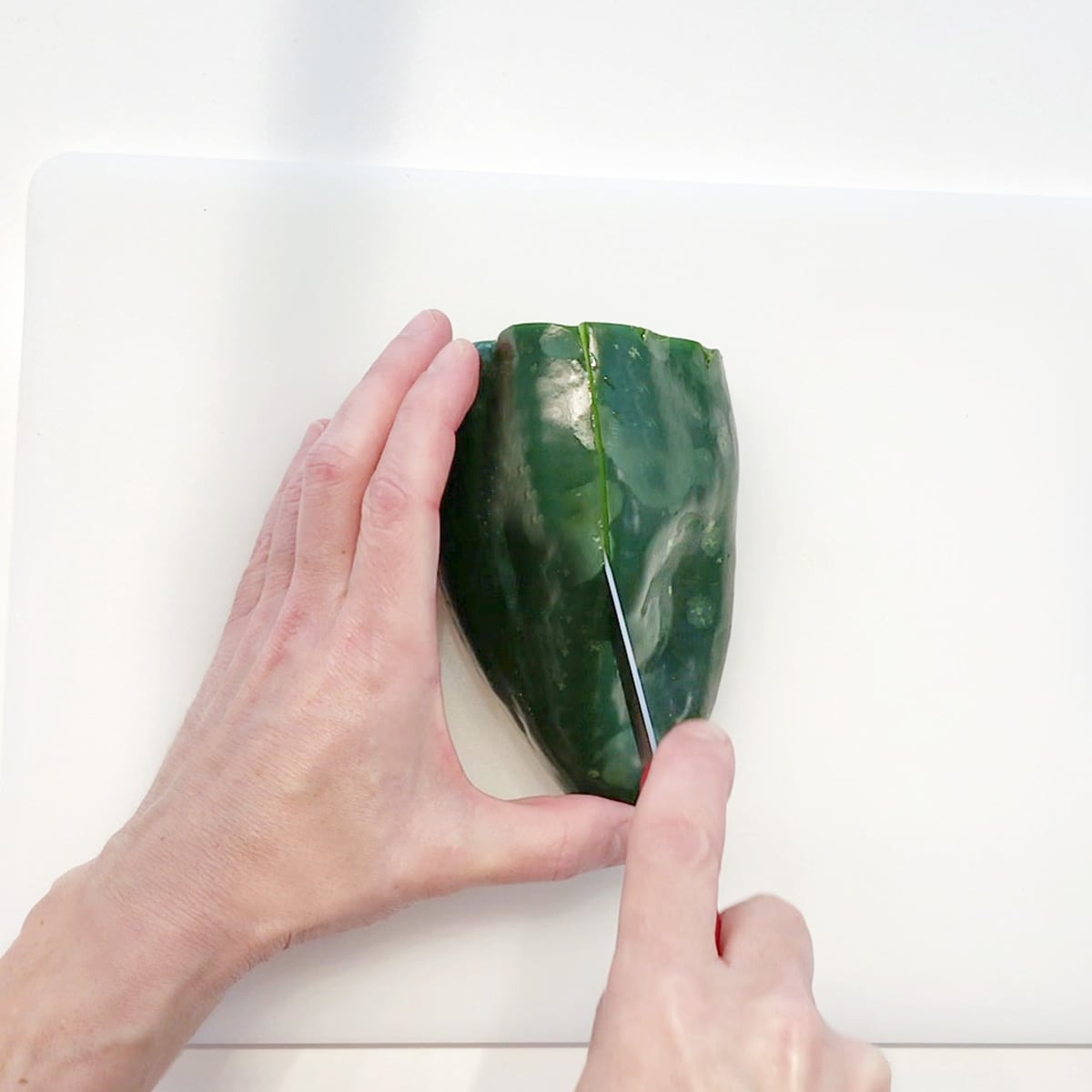 Preparing the poblanos.