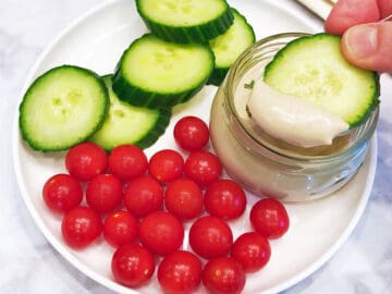 Tahini sauce is served with vegetables for dipping.