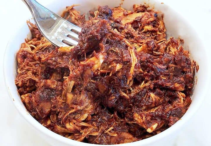 Serving pulled chicken.