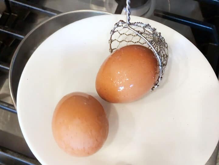 Removing the eggs from the water.
