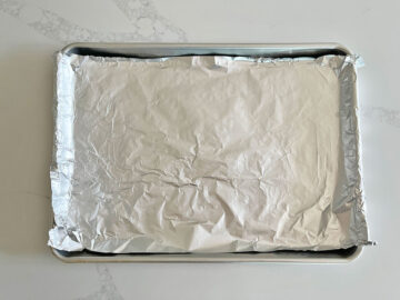 A baking sheet lined with foil.