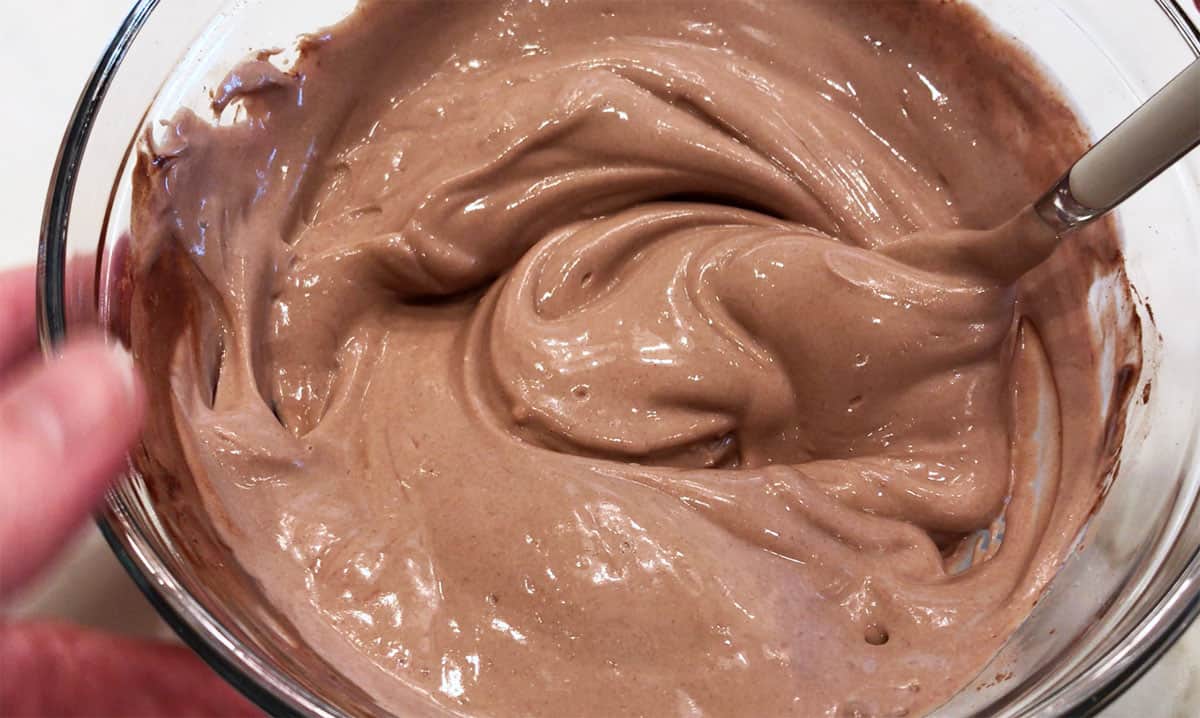 Mixing the yogurt.