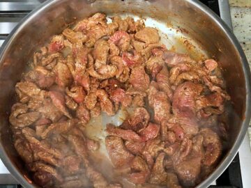 Cooking the beef.