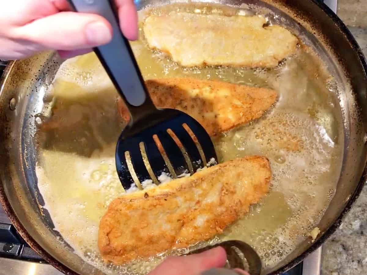 Flipping the fish.