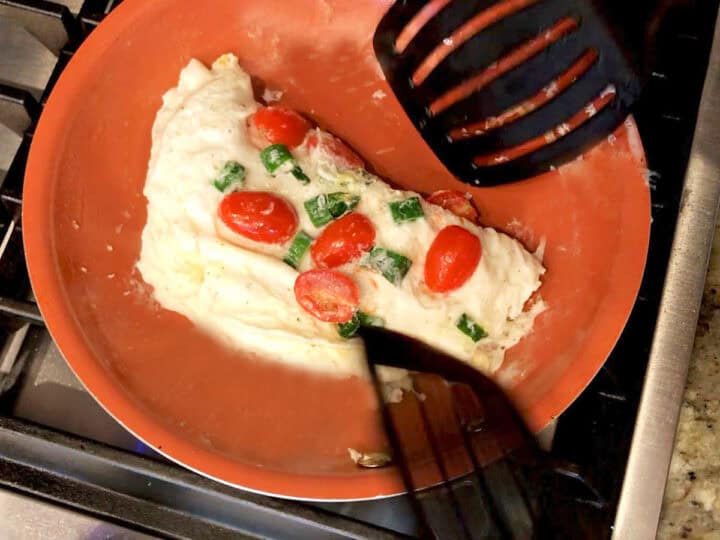 Folding the omelette.