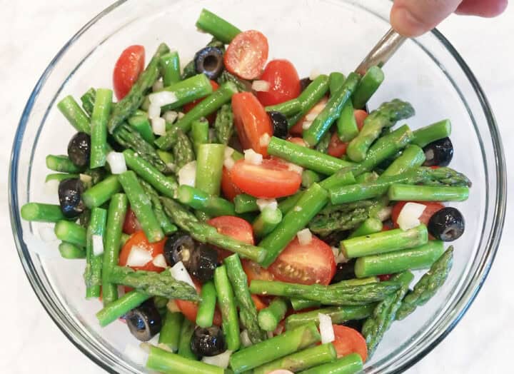 Remixing the salad.
