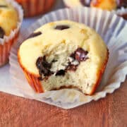 Protein muffins are served on a wooden surface.
