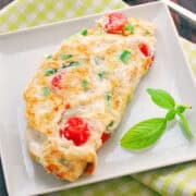 An egg white omelette is served on a white plate.