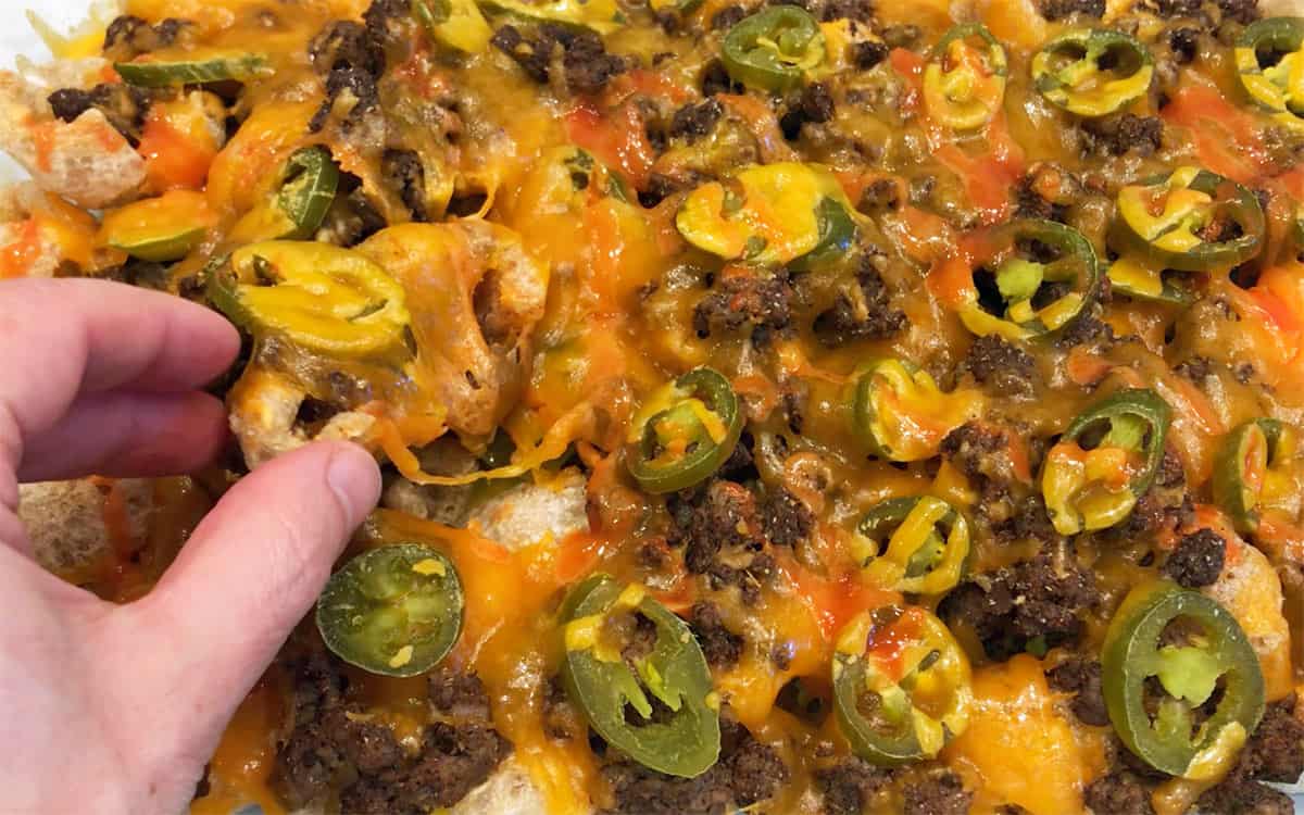 Eating the nachos.