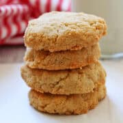 Keto shortbread cookies are stacked on a plate.