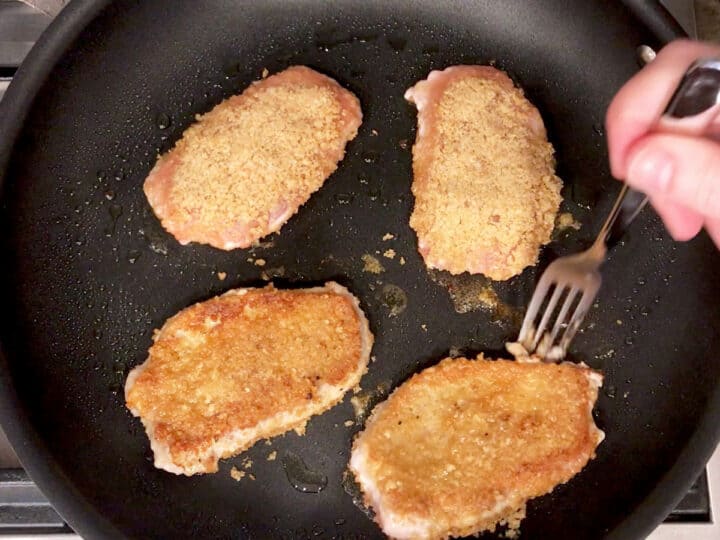 Flipping the chops.