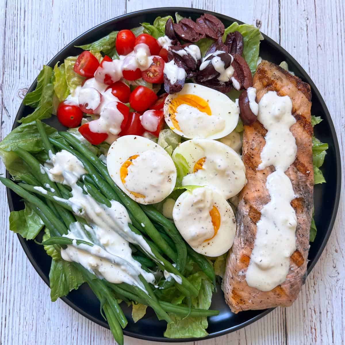 Nicoise salad with blue cheese dressing.