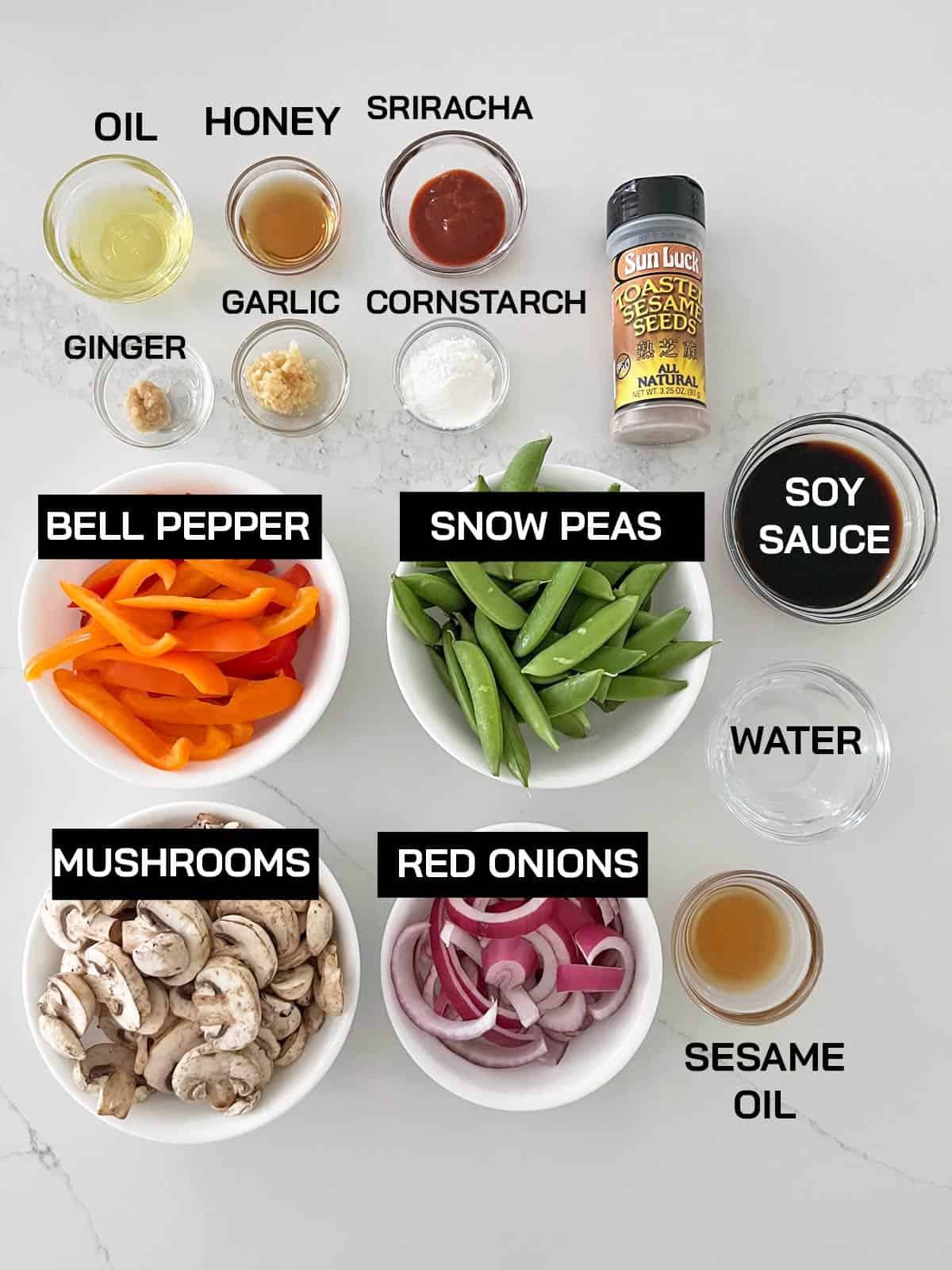 The ingredients needed to make a vegetable stir-fry.