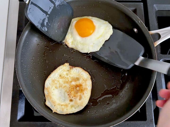 Flipping the eggs.