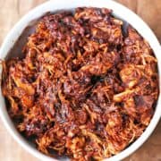 Pulled chicken is served in a bowl.
