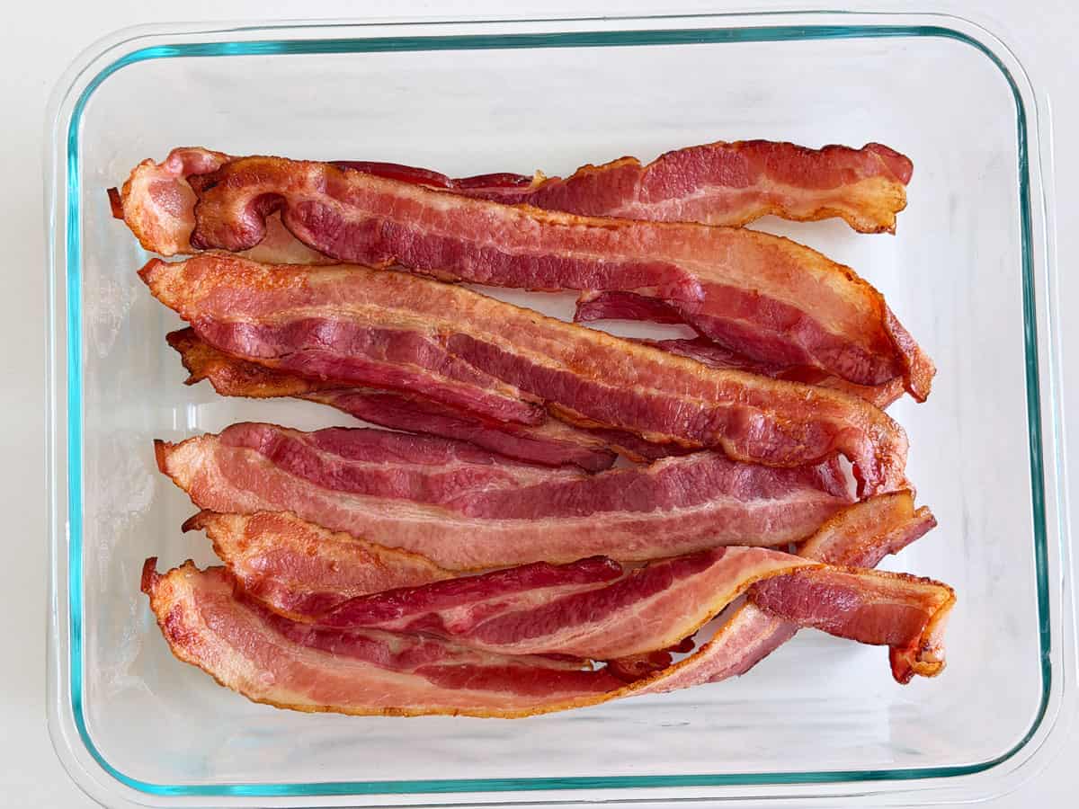 Bacon is stored in a glass container.